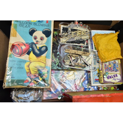 398 - THREE BOXES OF VINTAGE TOYS AND JIGSAWS, to include a balsa wood aircraft making kit, a Tri-ang part... 