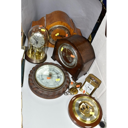 409 - FIVE CLOCKS AND TWO BAROMETERS, comprising a Weston Super quartz wall clock, Hermle quartz anniversa... 