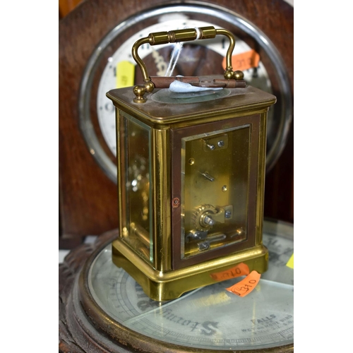 409 - FIVE CLOCKS AND TWO BAROMETERS, comprising a Weston Super quartz wall clock, Hermle quartz anniversa... 