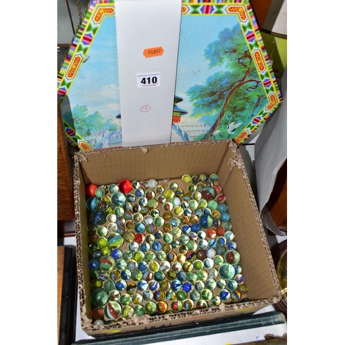 410 - A BOXED CHINESE CHECKERS SET, together with a box of glass marbles