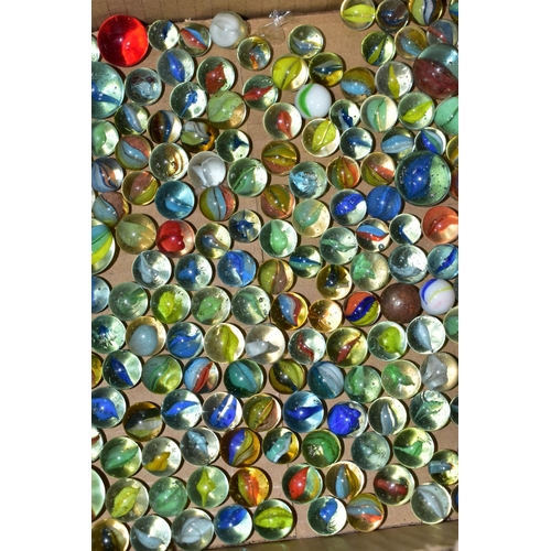 410 - A BOXED CHINESE CHECKERS SET, together with a box of glass marbles