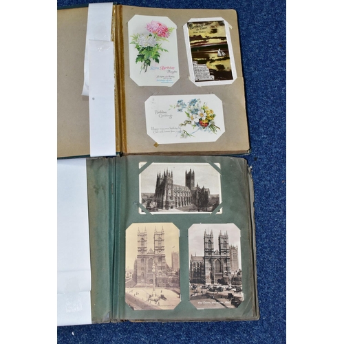 411 - POSTCARDS, approximately 455 postcards in two albums, album one features 220 ecclesiastical themed p... 