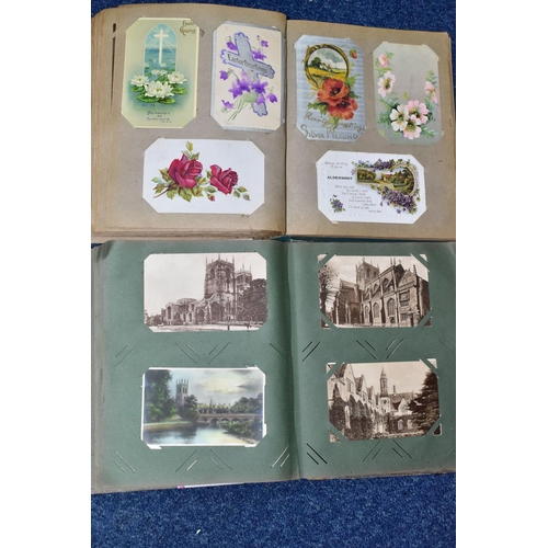 411 - POSTCARDS, approximately 455 postcards in two albums, album one features 220 ecclesiastical themed p... 