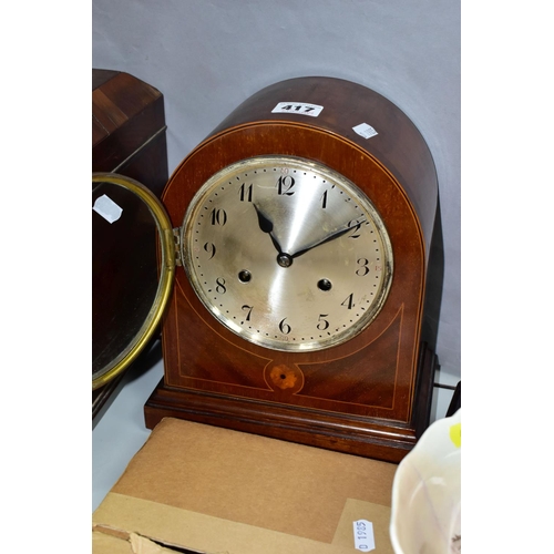 417 - A JUNGHANS MAHOGANY MANTLE CLOCK, runs briefly, chimes ok, with key and pendulum, together with a bo... 