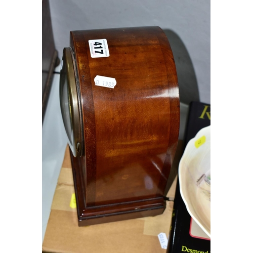 417 - A JUNGHANS MAHOGANY MANTLE CLOCK, runs briefly, chimes ok, with key and pendulum, together with a bo... 