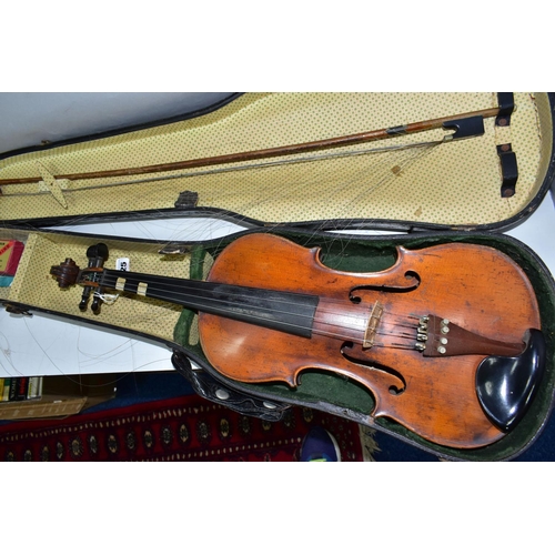 425 - A CASED VINTAGE VIOLIN, with a two piece back, bears a printed Antonius Stradivarius label, length o... 