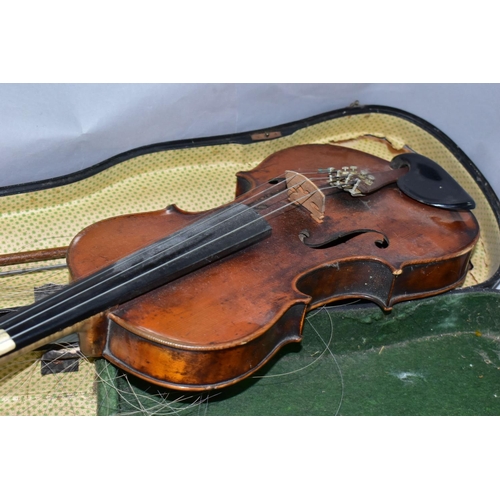 425 - A CASED VINTAGE VIOLIN, with a two piece back, bears a printed Antonius Stradivarius label, length o... 