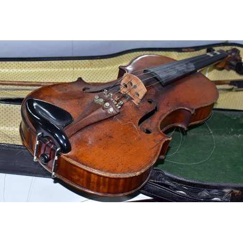 425 - A CASED VINTAGE VIOLIN, with a two piece back, bears a printed Antonius Stradivarius label, length o... 