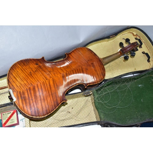 425 - A CASED VINTAGE VIOLIN, with a two piece back, bears a printed Antonius Stradivarius label, length o... 