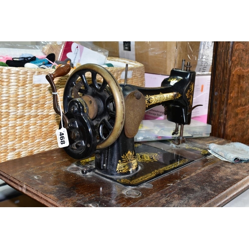 468 - A VINTAGE SINGER SEWING MACHINE AND HABERDASHERY ITEMS ETC, sewing machine is manually operated, wit... 