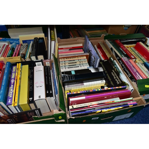 506 - FOUR BOXES OF BOOKS, over one hundred hardback and paperback titles to include art, music, magazines... 