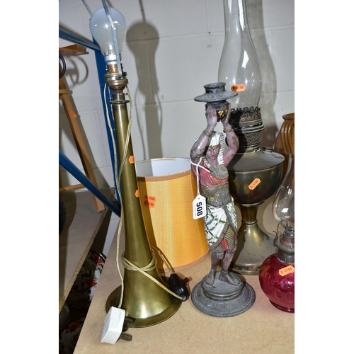 508 - A GROUP OF FOUR LAMPS, comprising a brass oil lamp, height 56cm to top of glass chimney (no shade), ... 