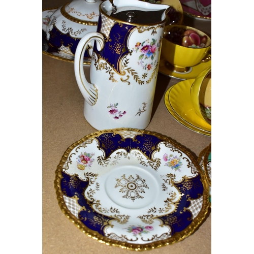 516 - A GROUP OF AYNSLEY 'ORCHARD GOLD' YELLOW CUPS AND COALPORT TEAWARES comprising  Aynsley 'Orchard Gol... 