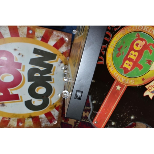 538 - THREE MODERN DECORATIVE ILLUMINATED ADVERTISING SIGNS, 'Pop Corn' and 'Now Showing' approximate size... 