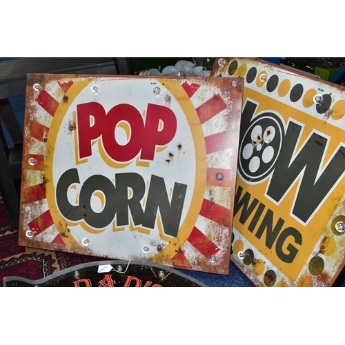 538 - THREE MODERN DECORATIVE ILLUMINATED ADVERTISING SIGNS, 'Pop Corn' and 'Now Showing' approximate size... 