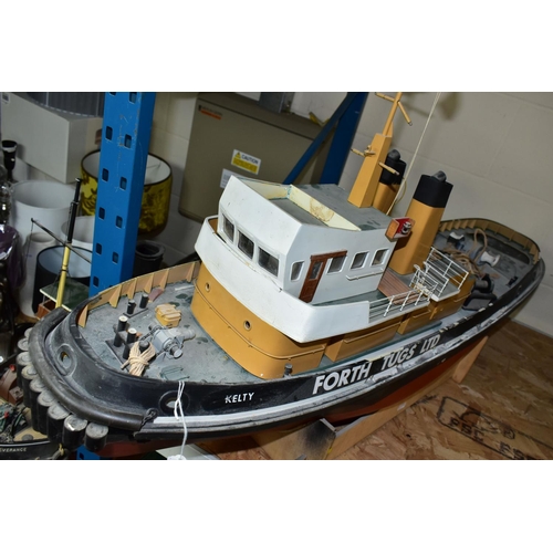 551 - A RADIO CONTROL MODEL OF A TUG BOAT 'KELTY', of fibreglass, wood and plastic construction, fitted wi... 