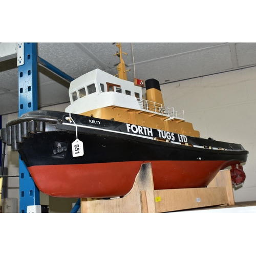 551 - A RADIO CONTROL MODEL OF A TUG BOAT 'KELTY', of fibreglass, wood and plastic construction, fitted wi... 