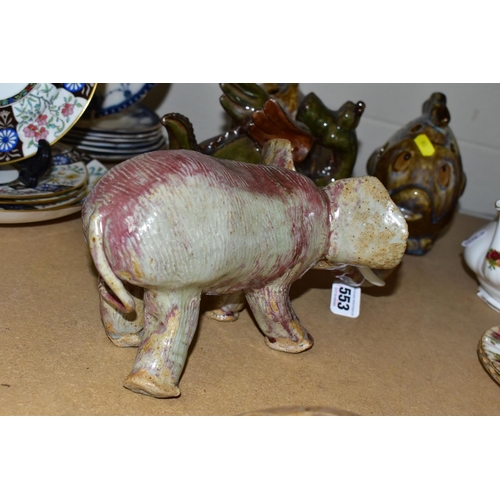 553 - FIVE AMATEUR STUDIO POTTERY ANIMALS, comprising a tortoise, elephant, dragon and two fish with apert... 