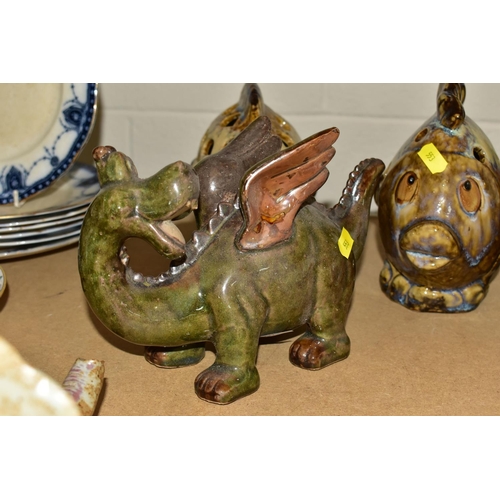 553 - FIVE AMATEUR STUDIO POTTERY ANIMALS, comprising a tortoise, elephant, dragon and two fish with apert... 