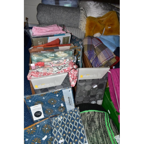 557 - FIVE BOXES OF DUVET COVERS, PILLOW CASES, THROWS AND HABERDASHERY ETC, most appear to be in unused c... 