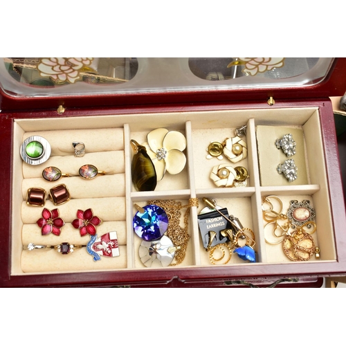 106 - A LARGE ASSORTMENT OF COSTUME JEWELLERY AND BOXES, to include copper bangles, assorted earrings, bea... 