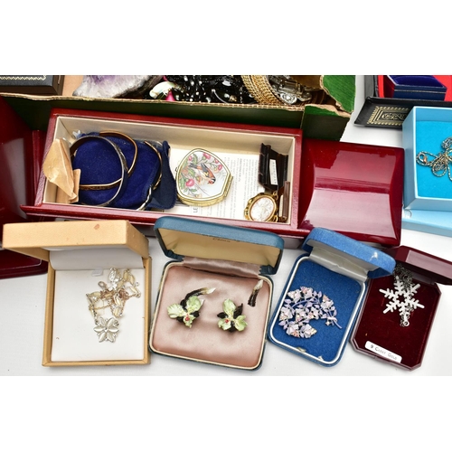 106 - A LARGE ASSORTMENT OF COSTUME JEWELLERY AND BOXES, to include copper bangles, assorted earrings, bea... 
