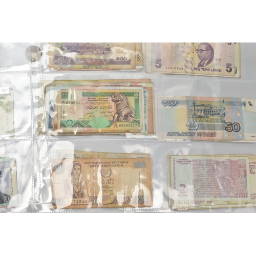122 - A QUANTITY OF BANKNOTE SLEEVES CONTAINING USED WORLD BANKNOTES TO INCLUDE SOME WORLD COINAGE