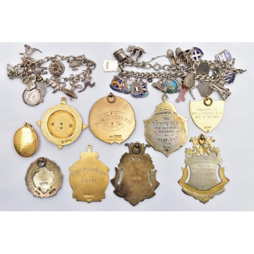 21 - A SELECTION OF MAINLY SILVER ENAMEL MASONIC MEDALS AND TWO WHITE METAL CHARM BRACELETS, to include s... 