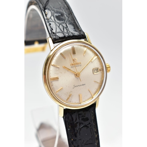 23 - A GENTLEMANS OMEGA SEAMASTER WRISTWATCH, the circular champagne dial, with baton hourly markers, dat... 