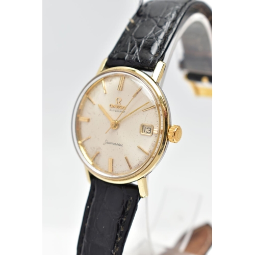 23 - A GENTLEMANS OMEGA SEAMASTER WRISTWATCH, the circular champagne dial, with baton hourly markers, dat... 