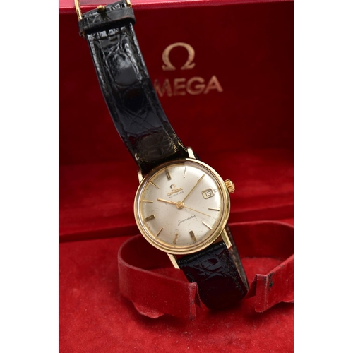 23 - A GENTLEMANS OMEGA SEAMASTER WRISTWATCH, the circular champagne dial, with baton hourly markers, dat... 
