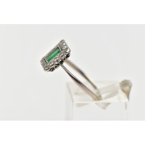 5 - A WHITE METAL EMERALD AND DIAMOND RING, of a rectangular form, centring on a rectangular cut emerald... 