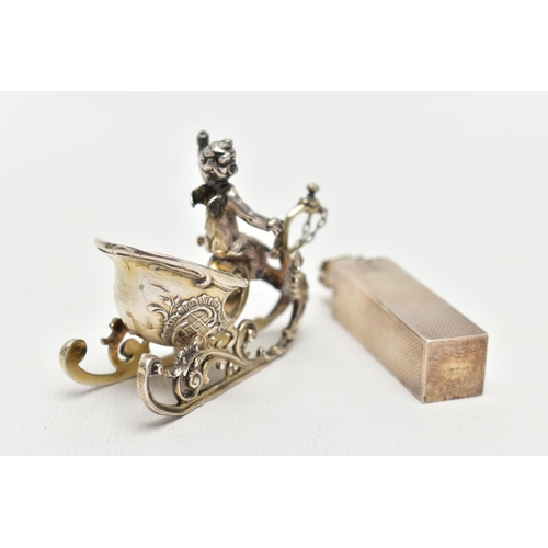 67 - A SILVER TRAVEL PERFUME CASE AND A WHITE METAL FIGURINE, engine turned pattern to the rectangular pe... 