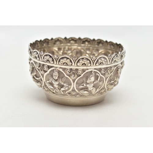 73 - A SILVER EMBOSSED BOWL, circular bowl featuring various religious figures and floral patterns, hallm... 
