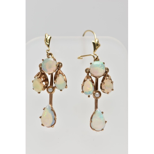 8 - A 9CT GOLD OPAL RING AND A PAIR OF OPAL DROP EARRINGS, the ring designed with three graduated oval o... 