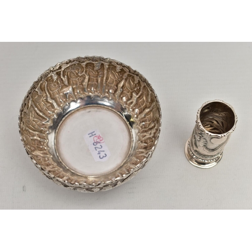 83 - AN EMBOSSED WHITE METAL BOWL AND SMALL VASE, the round bowl decorated with embossed multiple figural... 