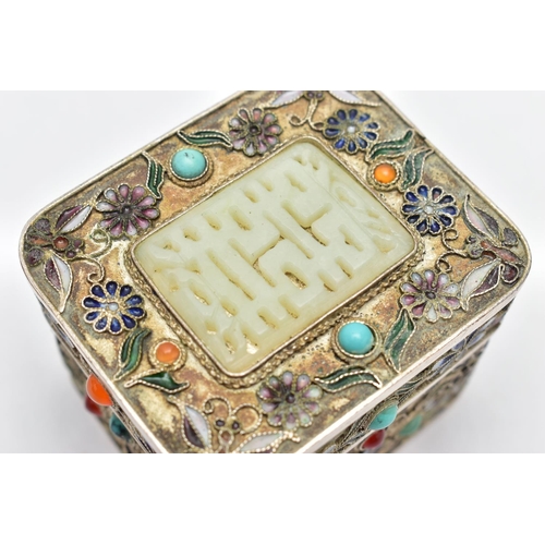 86 - A WHITE METAL, ENAMEL AND GEM SET BOX, of a rectangular form, decorated with enamelled flowers and b... 