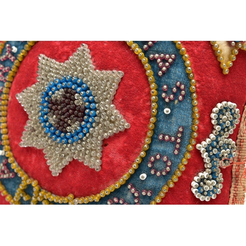 931A - A LATE VICTORIAN VELVET BEADWORK PIN CUSHION OF SQUARE FORM WITH ORDER OF THE GARTER TO THE CENTRE, ... 