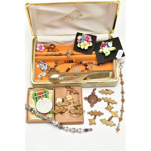 95 - A BOX OF WHITE METAL JEWELLERY AND MEDALS, to include a pair of copal amber stud earrings, a copal a... 