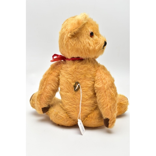 961A - A PEDIGREE GOLDEN PLUSH MUSICAL TEDDY BEAR, stitched nose, plastic eyes, jointed body, brown velvet ... 