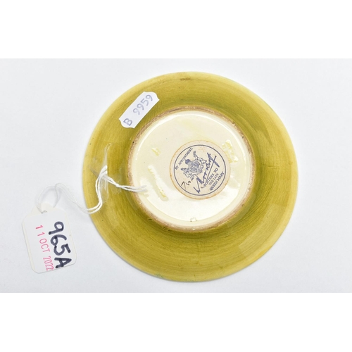 965A - A MOORCROFT POTTERY COASTER DECORATED WITH A PANSY ON A PALE YELLOW GROUND, impressed marks, bears b... 