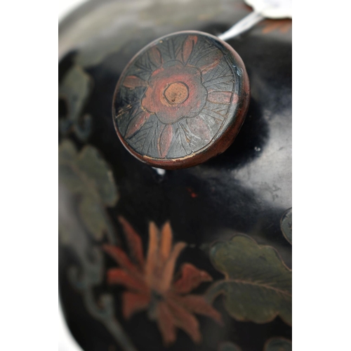 999A - A PAIR OF ORIENTAL BLACK LACQUERED PAPIER MACHE TEA CANNISTERS AND COVERS OF SHAPED OVAL FORM, the d... 