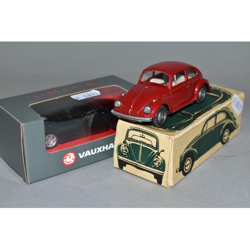 316 - TWO BOXED MODEL CARS, comprising a Wiking plastic Volkswagen Beetle Mod. 113, with a red body, and a... 