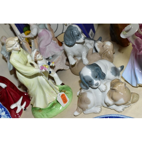 327 - A GROUP OF CERAMIC FIGURINES, FIGURE GROUPS AND DOG FIGURES, comprising Coalport 'The Garden Party' ... 