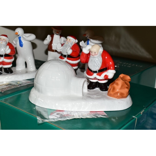 329 - THREE BOXED COALPORT RAYMOND BRIGGS' FATHER CHRISTMAS FIGURES, comprising two 'Line Dancing' limited... 