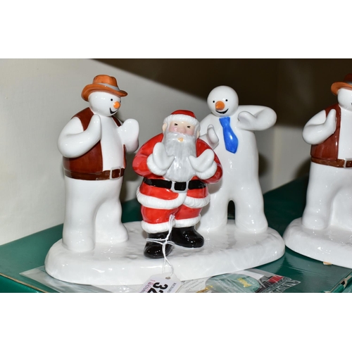 329 - THREE BOXED COALPORT RAYMOND BRIGGS' FATHER CHRISTMAS FIGURES, comprising two 'Line Dancing' limited... 