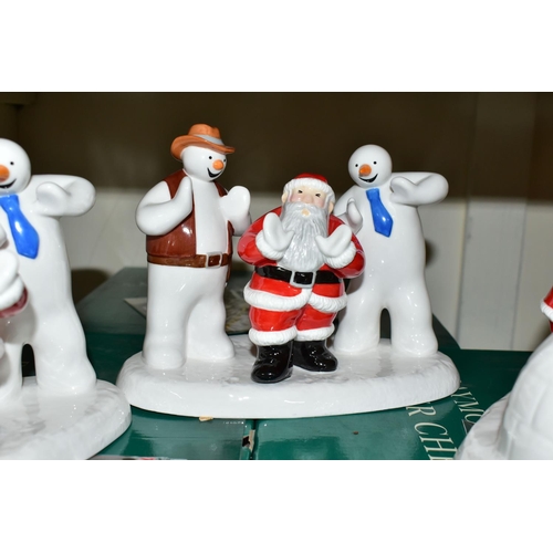 329 - THREE BOXED COALPORT RAYMOND BRIGGS' FATHER CHRISTMAS FIGURES, comprising two 'Line Dancing' limited... 