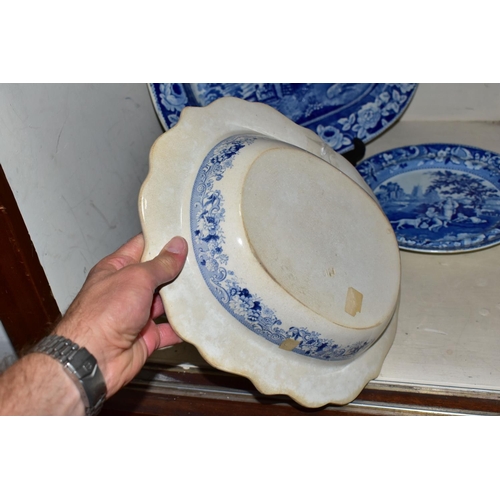 334 - FOUR PIECES OF ANTIQUE BLUE AND WHITE TRANSFER WARES, to include a meat plate printed with a rural v... 