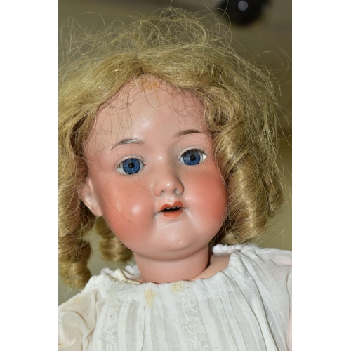338 - TWO DOLLS, comprising an Armand Marseille - Germany 390 -A 4 M doll, length 55cm, with blonde ringle... 
