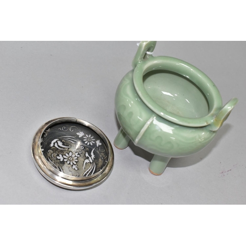 375 - A 20TH CENTURY CHINESE PORCELAIN CELADON GLAZED TWIN HANDLED CENSER WITH A PIERCED WHITE METAL COVER... 